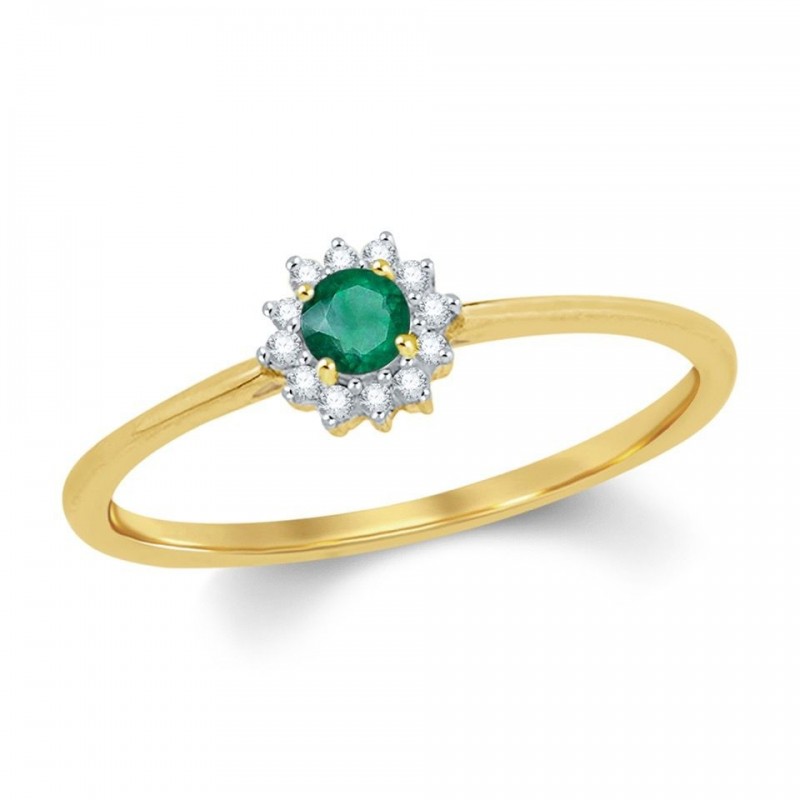 Bague en or jaune 750 millièmes , diamants et émeraude.